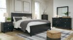 LANOLEE KING PANEL BEDROOM SUITE (BED + 2 NIGHTSTANDS + MIRRORED DRESSER + CHEST OF DRAWERS) - Image 8